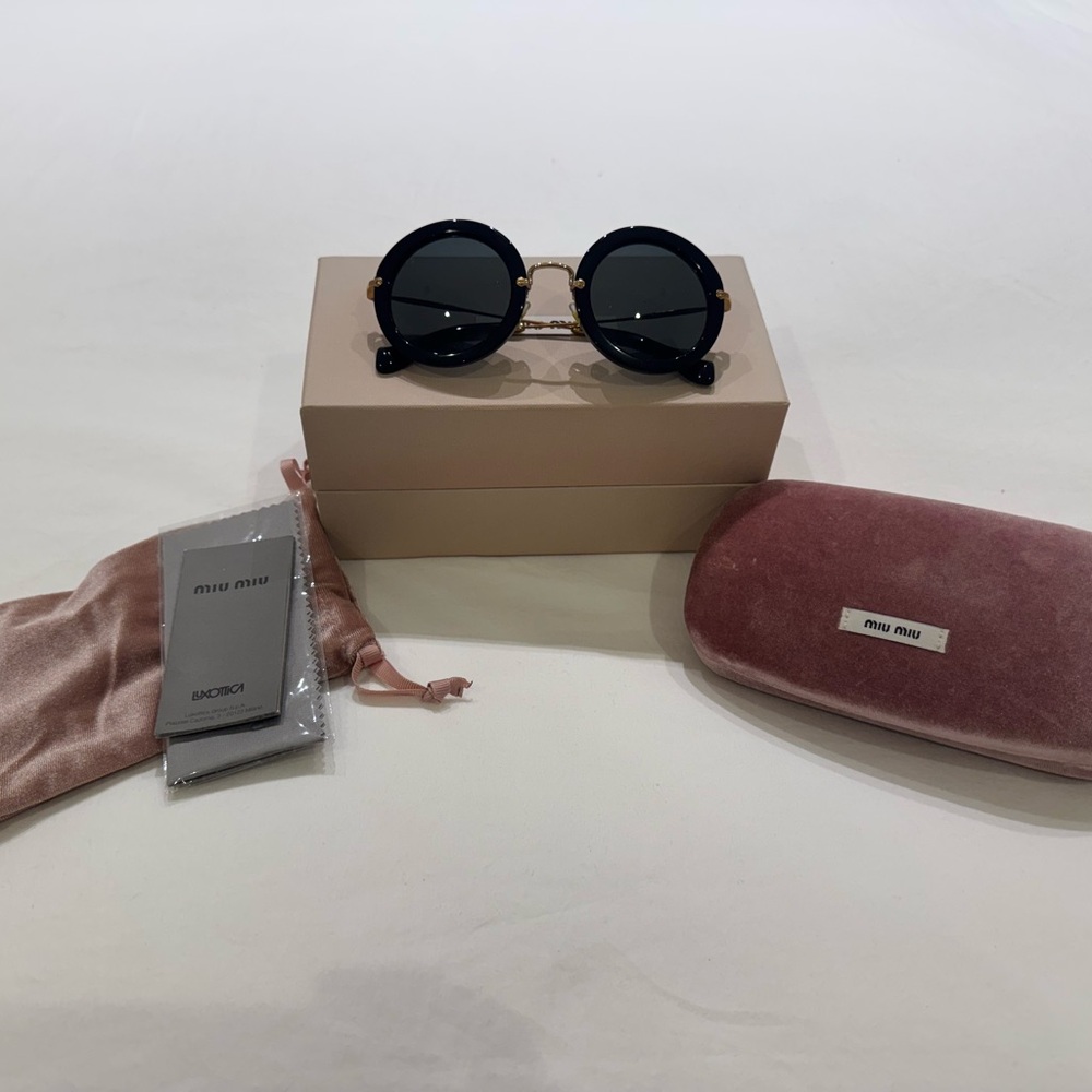 Miu miu sunglasses black and gold